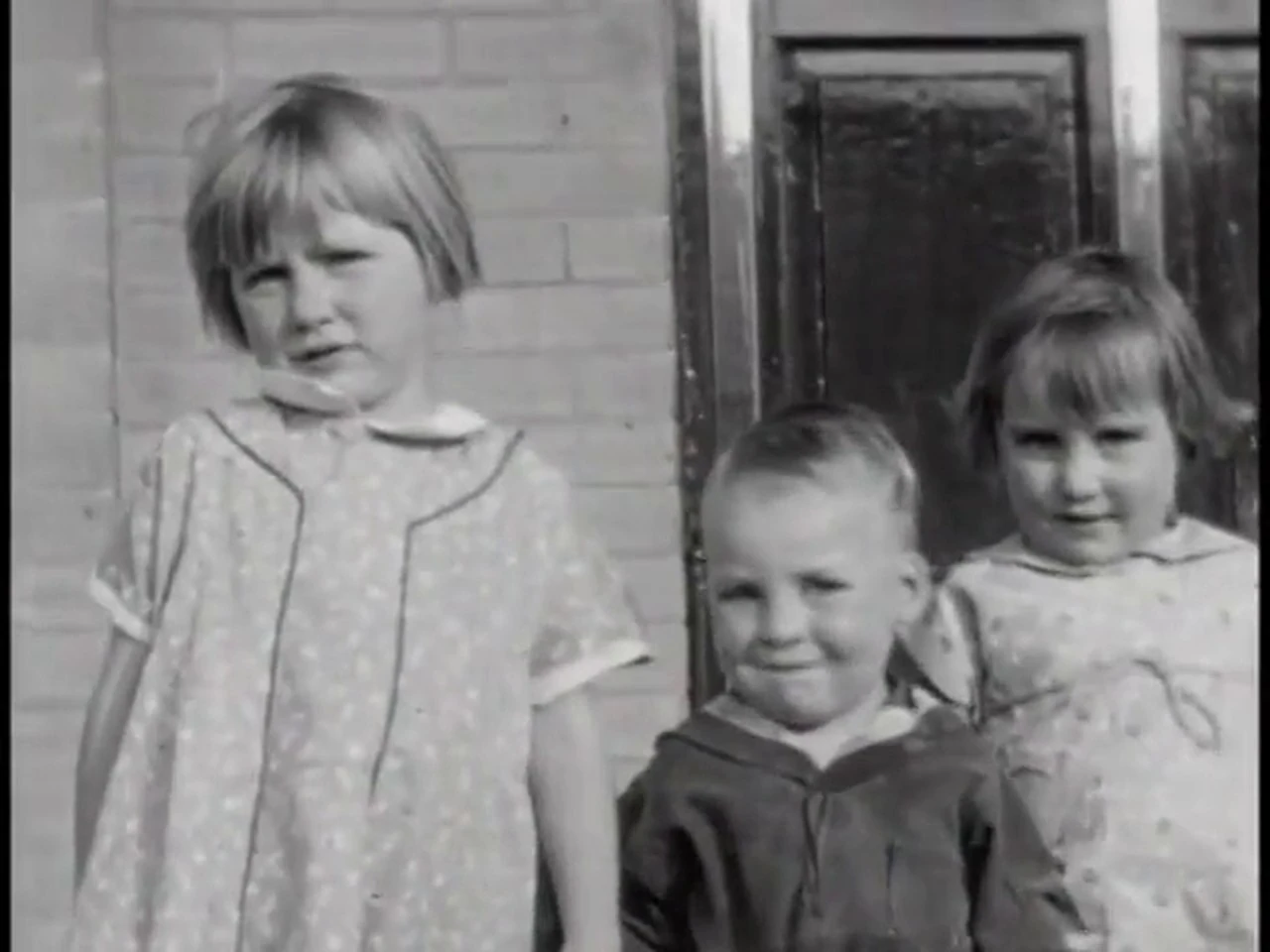 Original frame from the same 1938 film, soft and faded